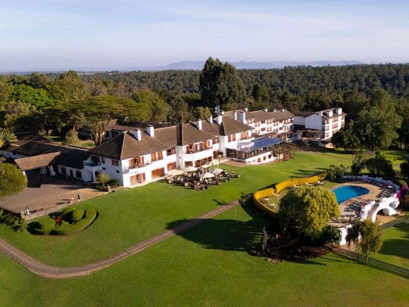 Main building of a colonial-era safari club hotel at the foot of Mount Kenya, Nanyuki